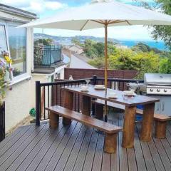 3 Bedroom Bungalow with great Sea Views, Private Hot Tub & Gardens