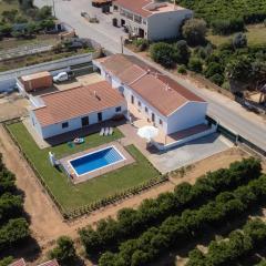 Villa para 10 em Porches com piscina aquecida e ar condicionado