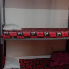 Dormitory bed space in a shared room
