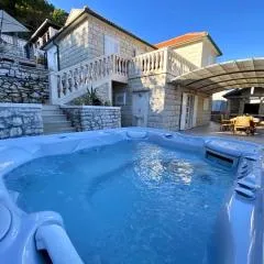 Villa Fjera with a sea view, hot tubs, terrace, BBQ