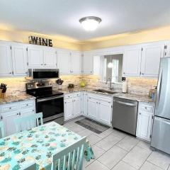 Three Bedrooms Two and half baths end unit few blocks from beach