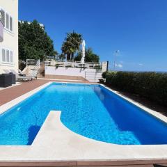 SUN apartment with SEA VIEW and shared POOL