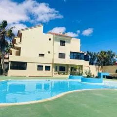 Surf & Chill Bungalow 69, quiet green oasis with community swimmingpool