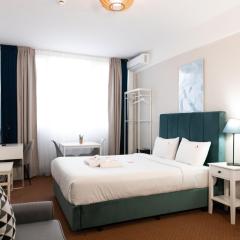 City Plaza Apartments & Rooms