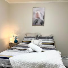 Private Unit underneath a family Home