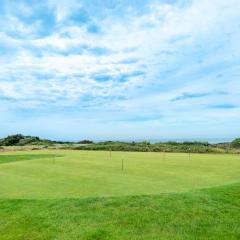 Vue sur mer, dunes et golf