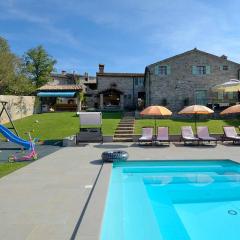 Estate with four stone villas and swimming pool in Buzet