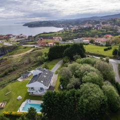 Wishome-Villa sobre el mar en Comillas, con piscina