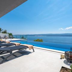 Villa Admira Maria with a heated pool and sea views