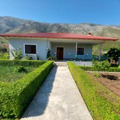 Flowery House near the Sea and the Mountain