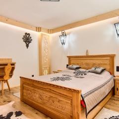 Apartament Zakopane utrzymany w stylu góralskiej chaty