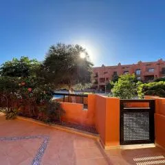 Cozy apartment with large terrace next to the pool