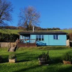 Badgers Den, a beautiful log cabin in a secluded valley close to the beach