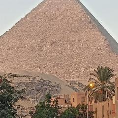 Giza pyramids view house