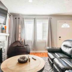 Charming Farmhouse Retreat near Downtown & University Modern Amenities, Fireplace & Porch!