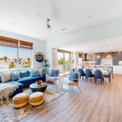 Seaside Serenity Retreat Inviting condo in Oceanside with rooftop, hot tub, balcony, and ocean views