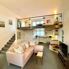 High-Ceiling Flat with Rooftop & Skyline View