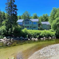 RE90 Rare riverfront family retreat - private slopeside home with AC, fast WiFi, and views