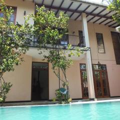 A tropical paradise; stunning house, pool, garden