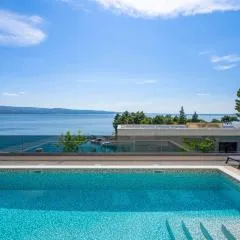 Luxury, seafront Villa IVAN with heated pool only 100m from beach