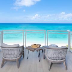The Beachcomber - Oceanfront Penthouses by Grand Cayman Villas & Condos