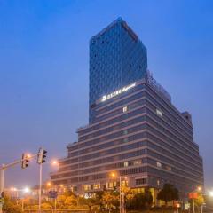 Magnotel Business Hotel Zhenjiang South Station Greenland Square