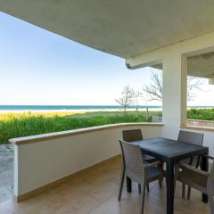 Beachfront apartment with exclusive access