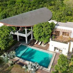 The Leaf by StayVista - An enchanting escape offering a pool, terrace, lush lawn, contemporary interiors, and indoor games