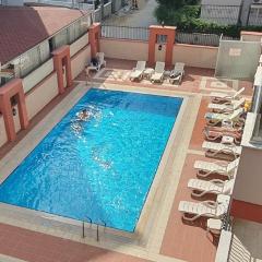 Large sunny apartment with swimming pool, 300 meters from the sea