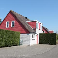 Nice holiday home with garden, on a holiday park 200m from the beach
