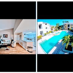 Dream Vacation Lovely Condo minutes from Beach King bed Heated pool Gym