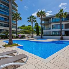 Stunning Seaside Apartment with Pool & Garden