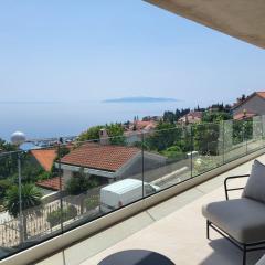 Premium apartment with beautiful sea view, short walk to the sea