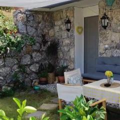 Stone Cottage garden, terrace sea and forest view