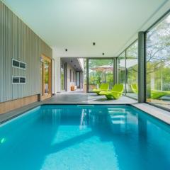 Modern villa with indoor swimming pool, in the middle of the Noiseaux nature
