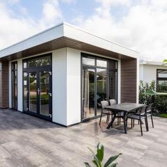 Stylish chalet with a dishwasher, in a holiday park at a recreational lake