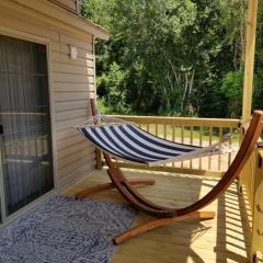Tiny home with hammock loft BBQ and yard