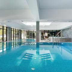 GREEN PORT Apartament with SWIMMING POOL, Spa & Gym Kołobrzeg by Noclegi Renters