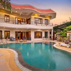 StayVista's Prakriti Farms - Mountain-View Villa with Outdoor Pool, Deck & Lawn featuring a Gazebo