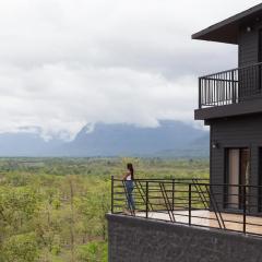 StayVista's Panoramic Peaks - Mountain-View Villa with Pool, Tent & Turf