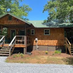 Updated cabin nestled on 10 acres in the woods, breathtaking Blue Ridge Mountain views