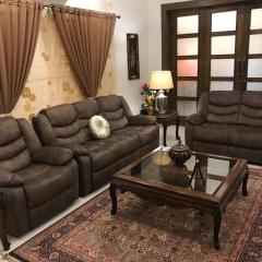 MJS Entire New Designer House, 5 BR, 13 bed, 2 living, reclining sofas, Italian kitchen, 6 bath, garage, side garden at prime location of Bahria Town, Islamabad
