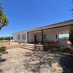 Villa con piscina y jardines privados