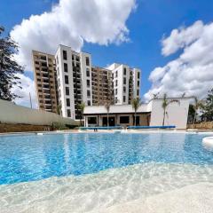 Emaza Lux Stylish, Modern 1 Bedroom Apartment, Pool & Gym, at Mi Vida Garden City