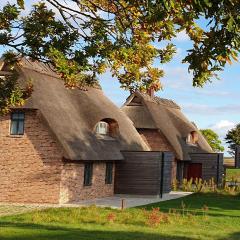 Reetdorf Geltinger Birk Malerhaus Wollgras