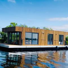 Surla Houseboat De Saek with tender