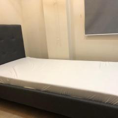 Comfy Room With Single Sized Bed, Study Space, Closet, and WiFi