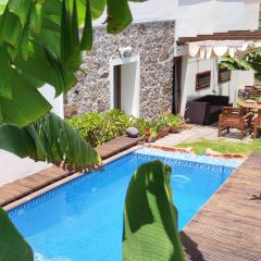 Villa Canaria piscina jacuzzi jardín