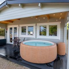 Luxury Log Cabin with Private Hot Tub & Sea Views