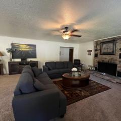 JI13- ,A two bedroom, one bath house with den, covered outdoor dining area and fenced in yard at our Joplin Inn home